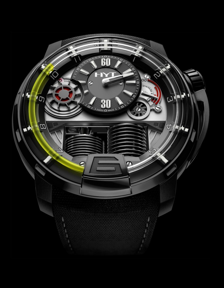 2LMX Watch uses rotating drums to indicate the time. 1