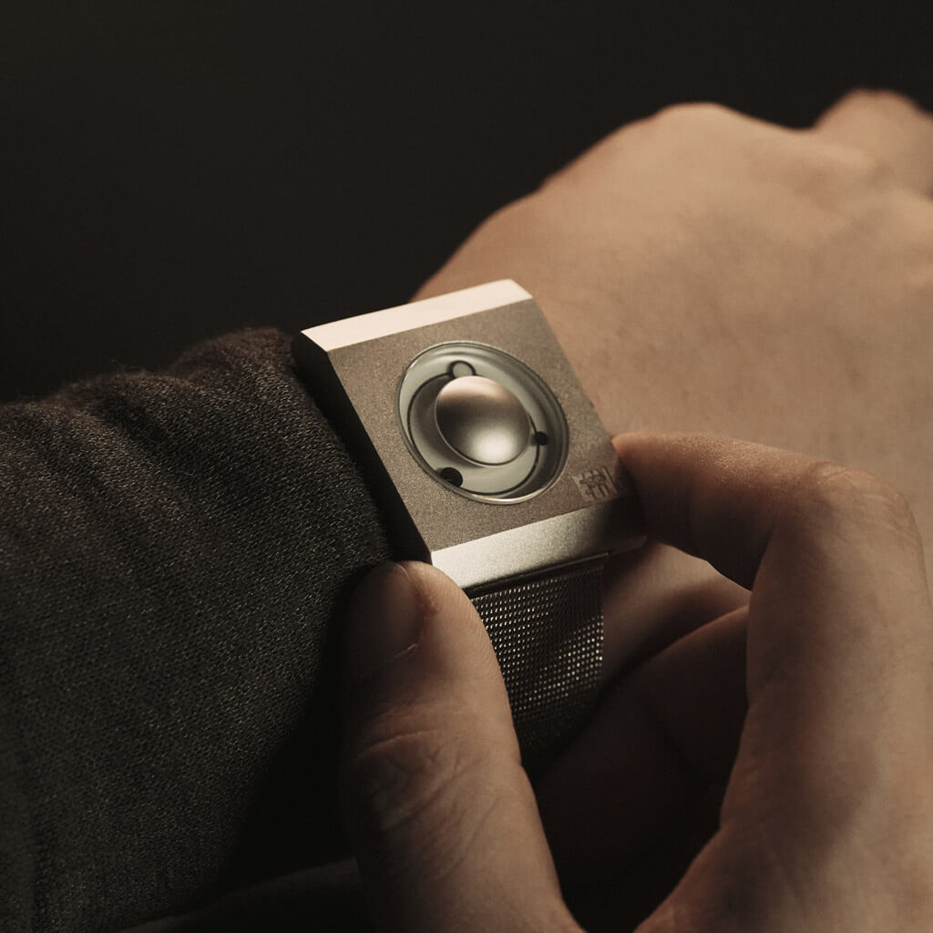 eclipse neo analog watch tokyoflash japan silver case silver strap on wrist 10 Unusual Watches for Men Under $500